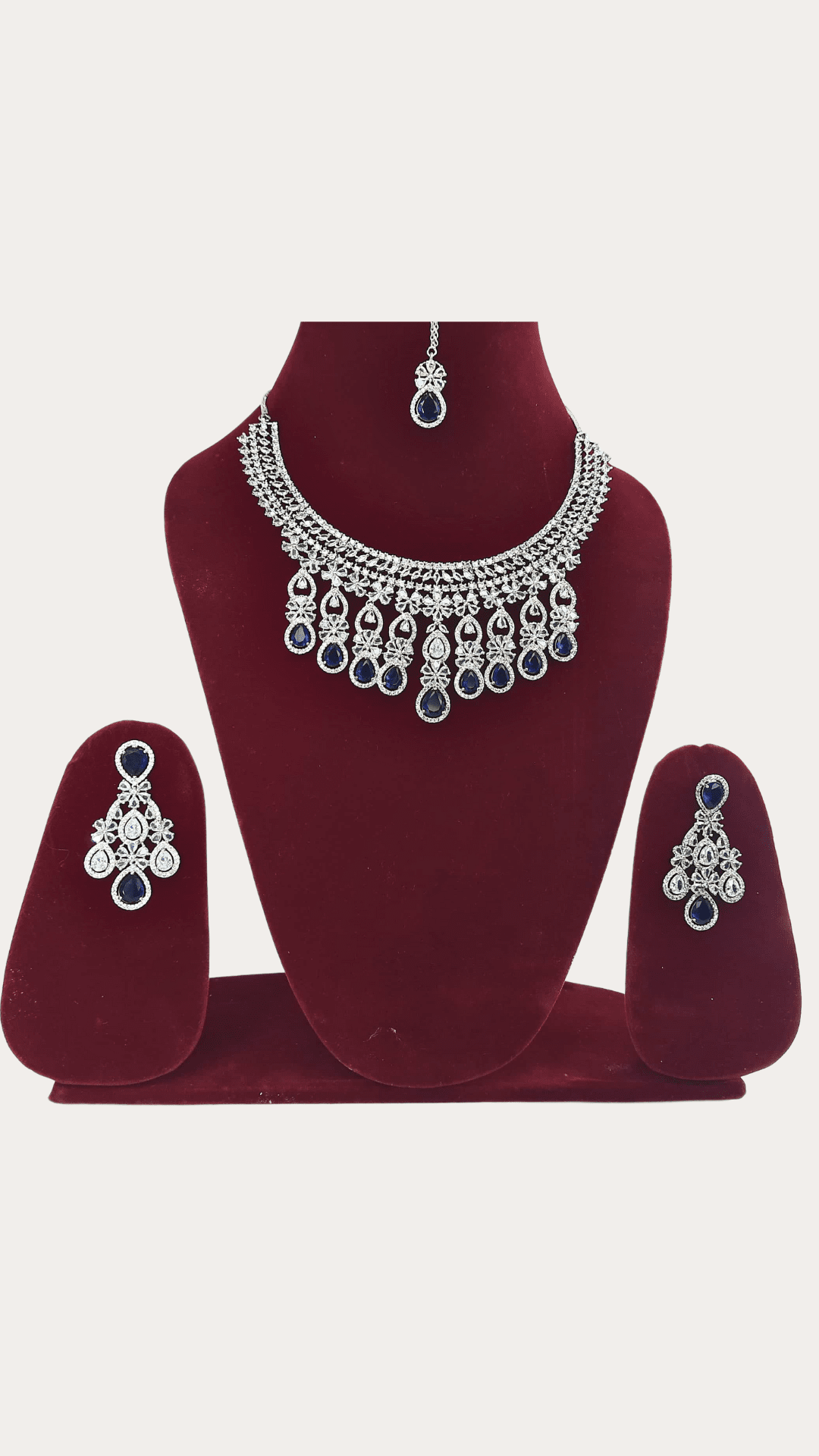 Dazzling Ad Stone Fitted Blue Colour Necklace Set With Maang Tikka