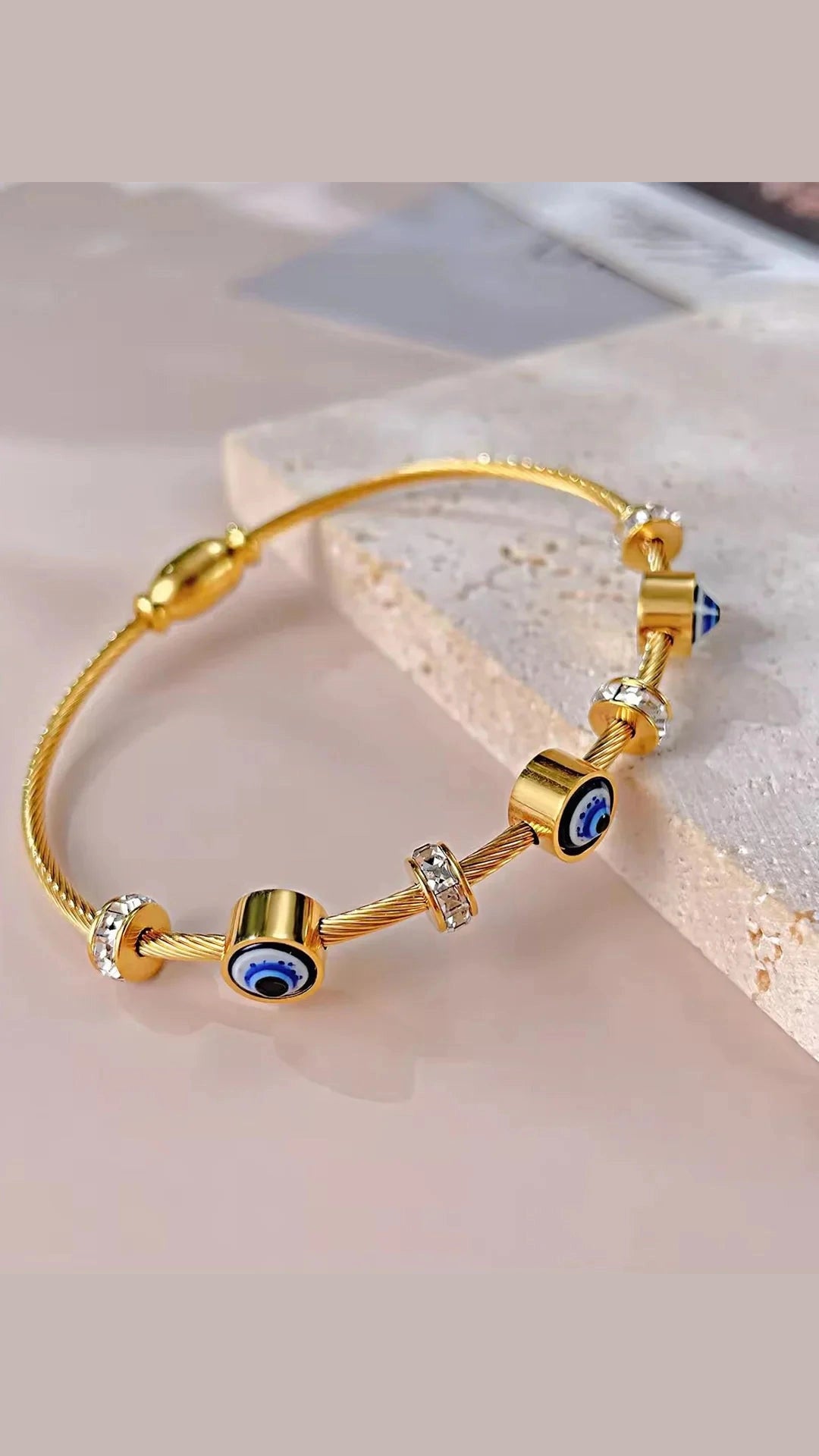 Stainless steel evil eye bracelet with magnet lock