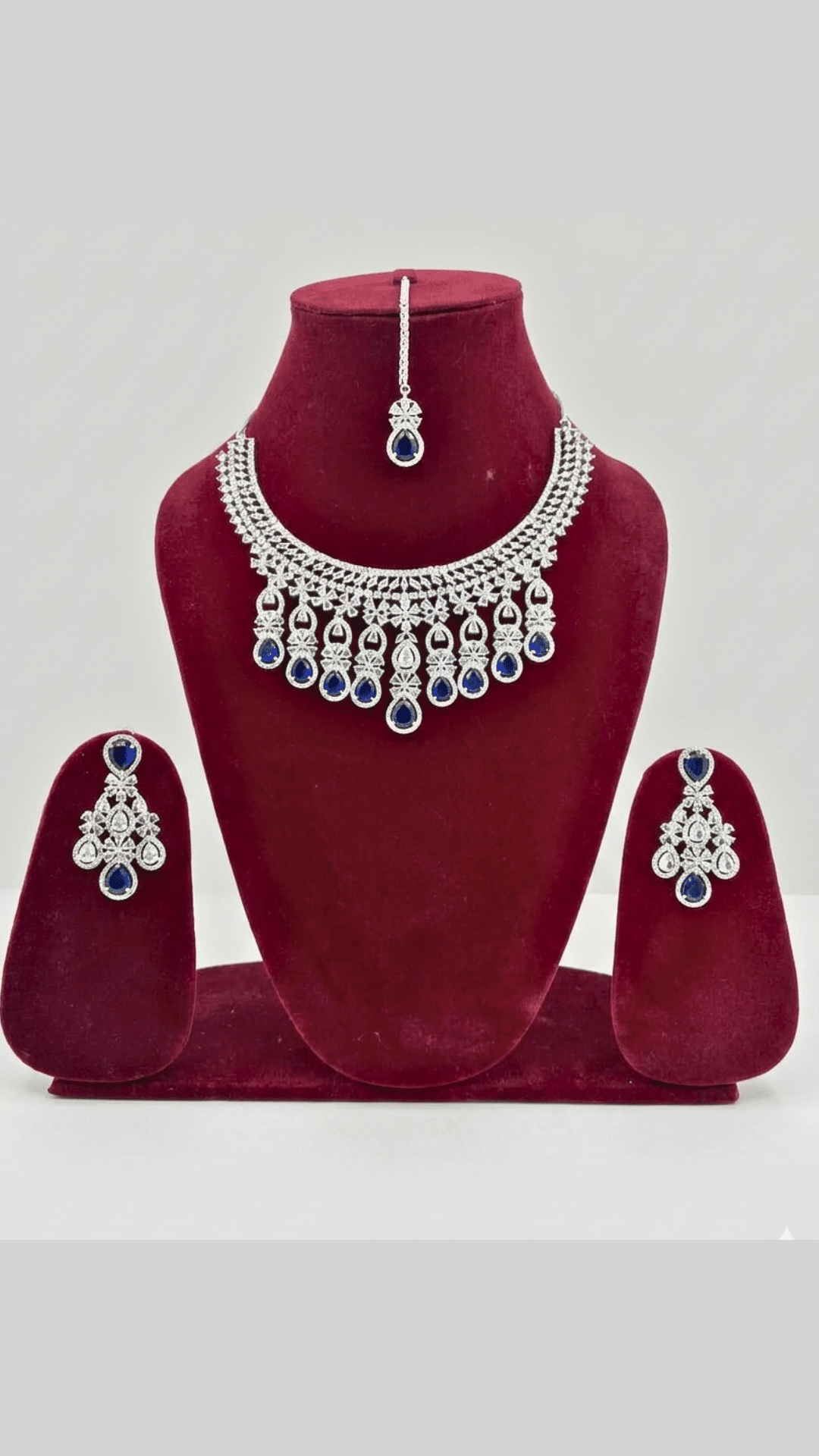 Dazzling Ad Stone Fitted Blue Colour Necklace Set With Maang Tikka