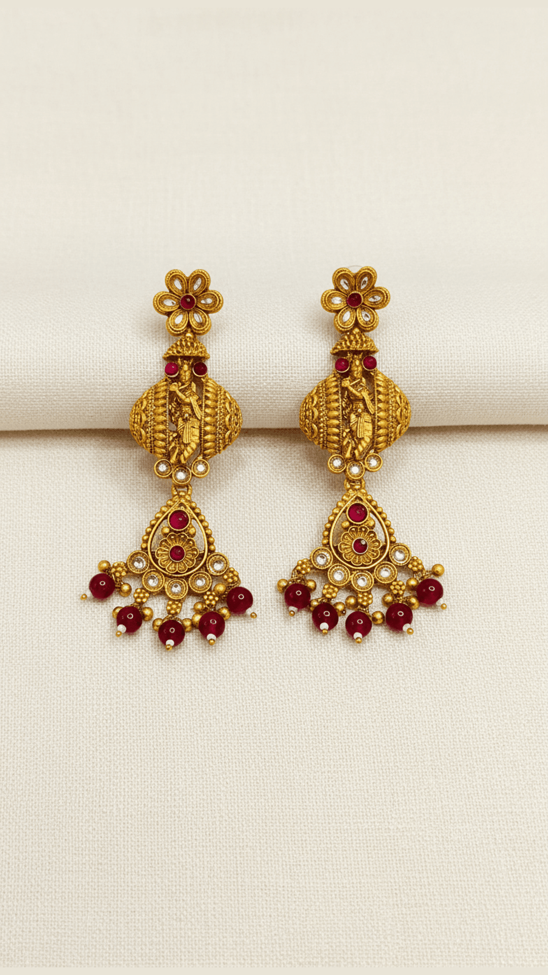 Traditional krishna kundan temple jhumki style golden earring with red drops