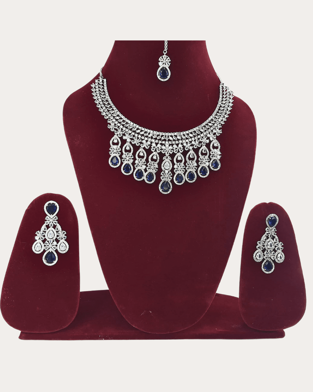 Dazzling Ad Stone Fitted Blue Colour Necklace Set With Maang Tikka