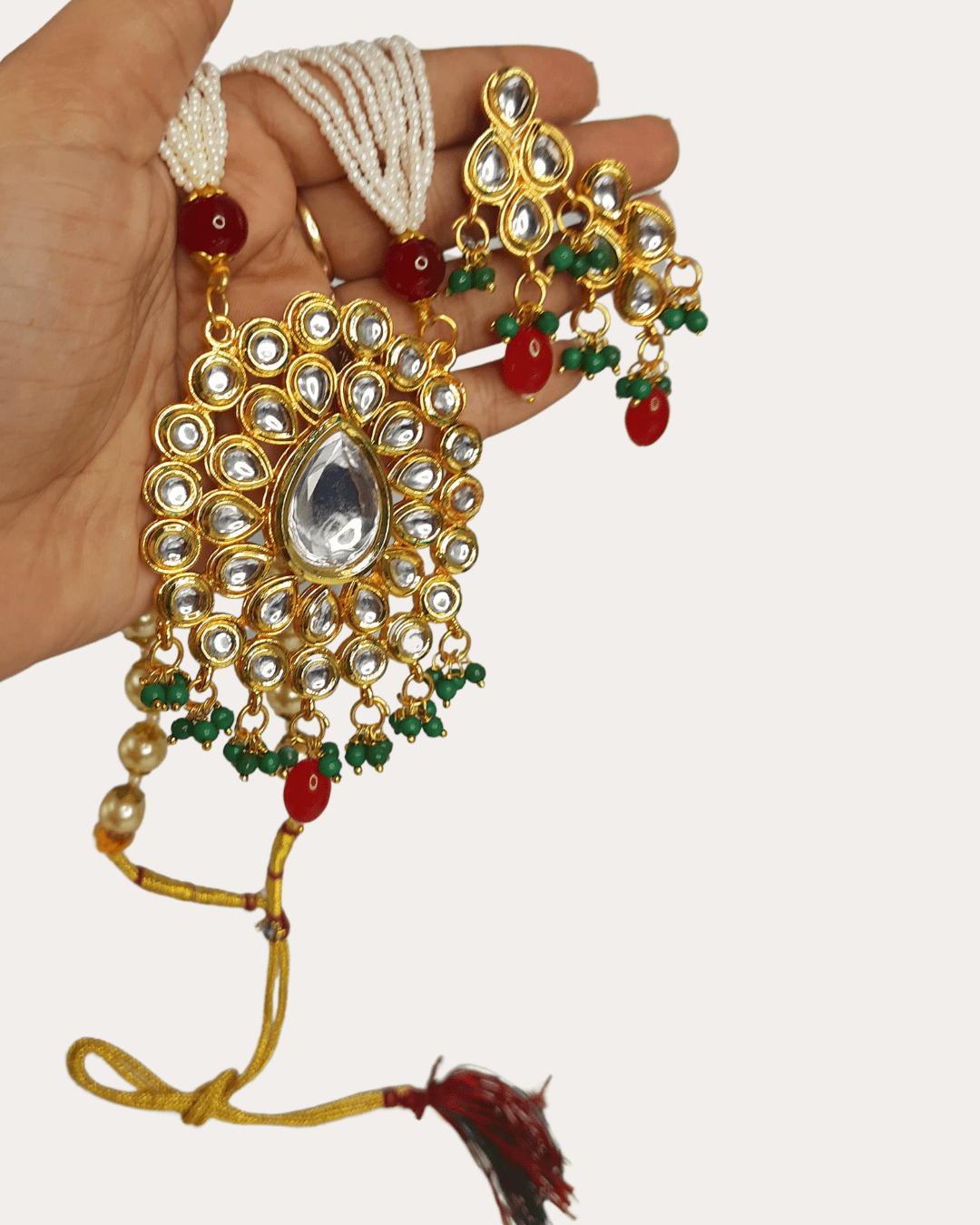 Stunning Kundan work, pearls, and green and red stone moti necklace