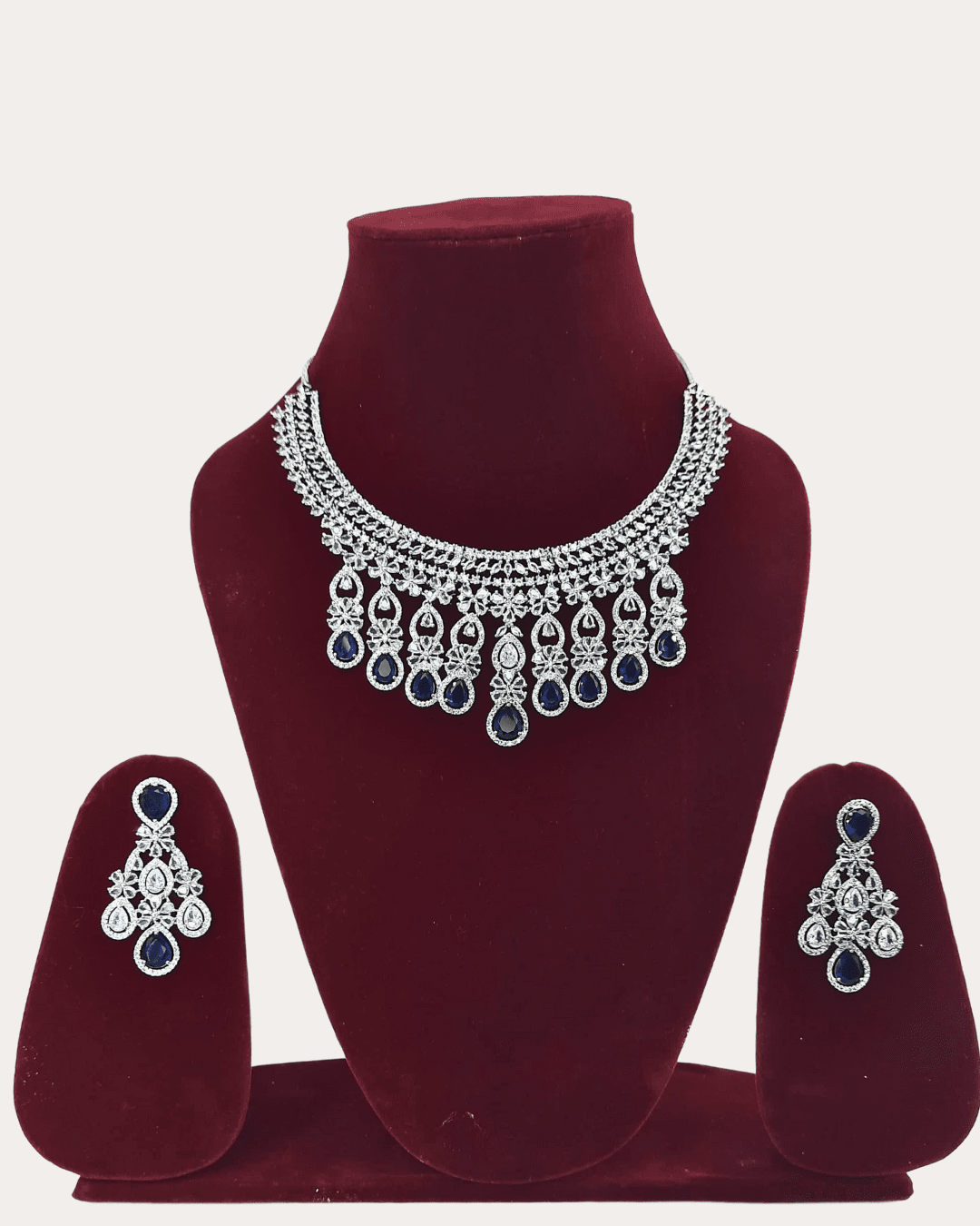 Dazzling Ad Stone Fitted Blue Colour Necklace Set With Maang Tikka