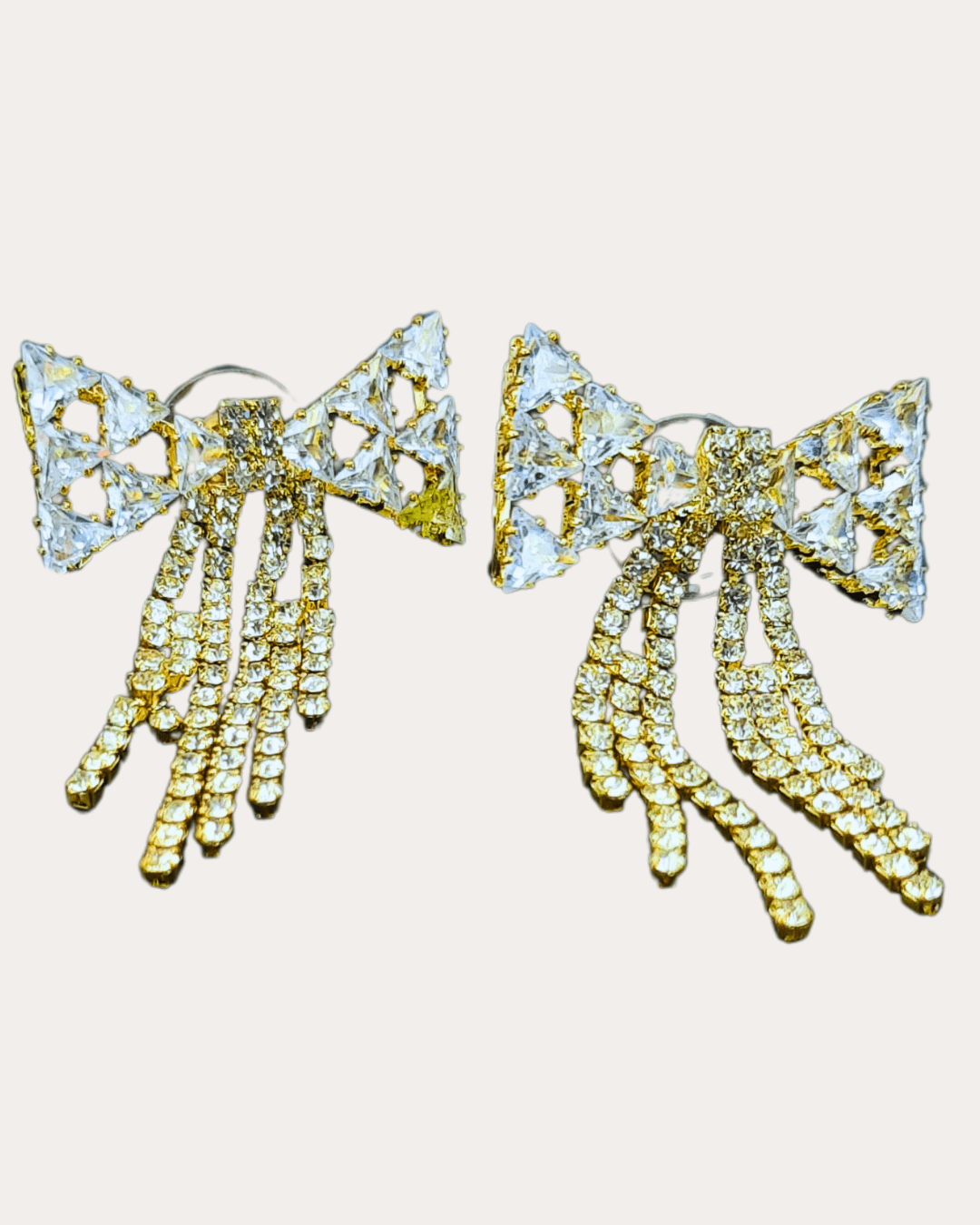 Bow Earring with Beautifully Crafted Stone in Yellow Metal