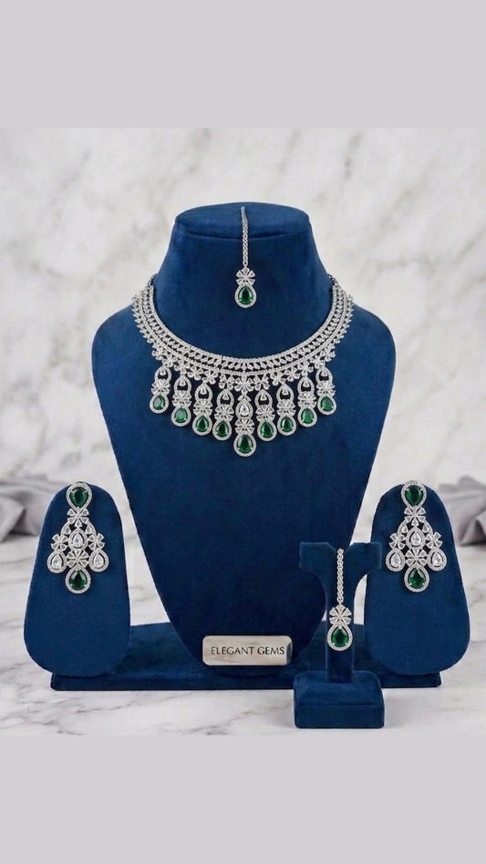 Dazzling Ad Stone Fitted Green Colour Necklace Set With Maang Tikka